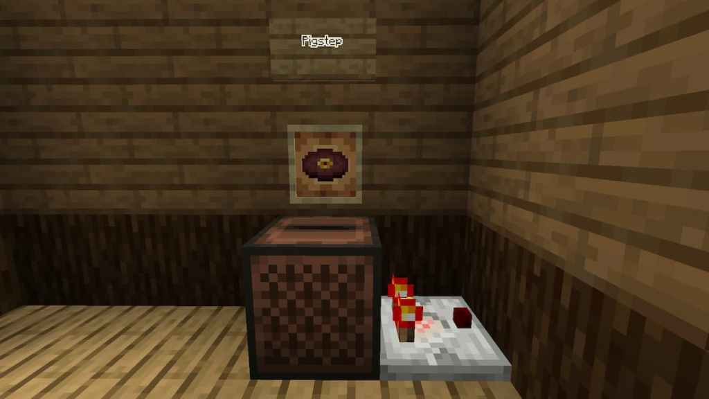 The Pigstep music disc powering a Redstone Comparator from a jukebox