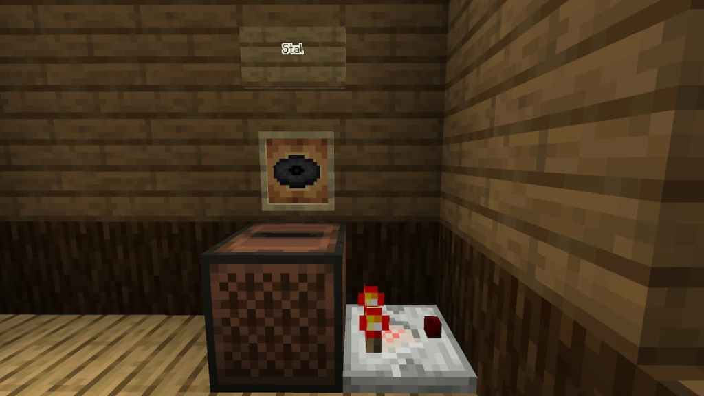 A jukebox containing the Stal music disc next to a Redstone Comparator