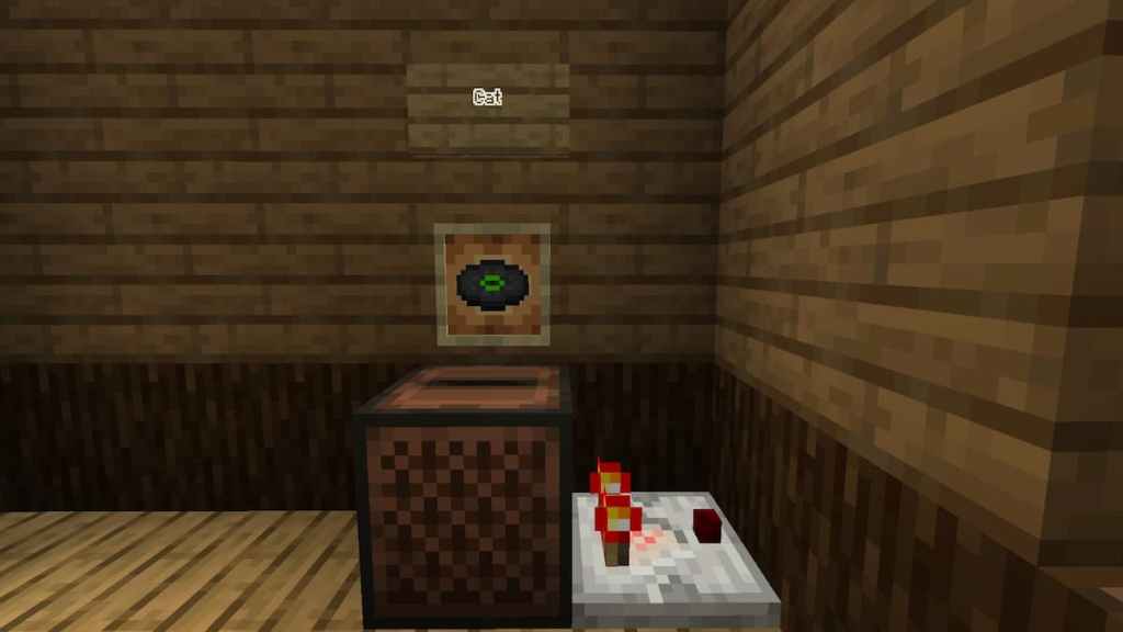 The Cat Music Disk powering a Redstone Comparator in Minecraft