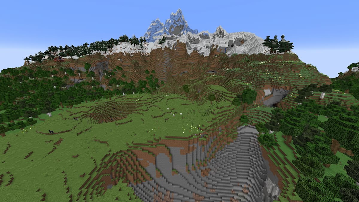 A Mountain Meadow in front of an Icy Peaks mountain in Minecraft