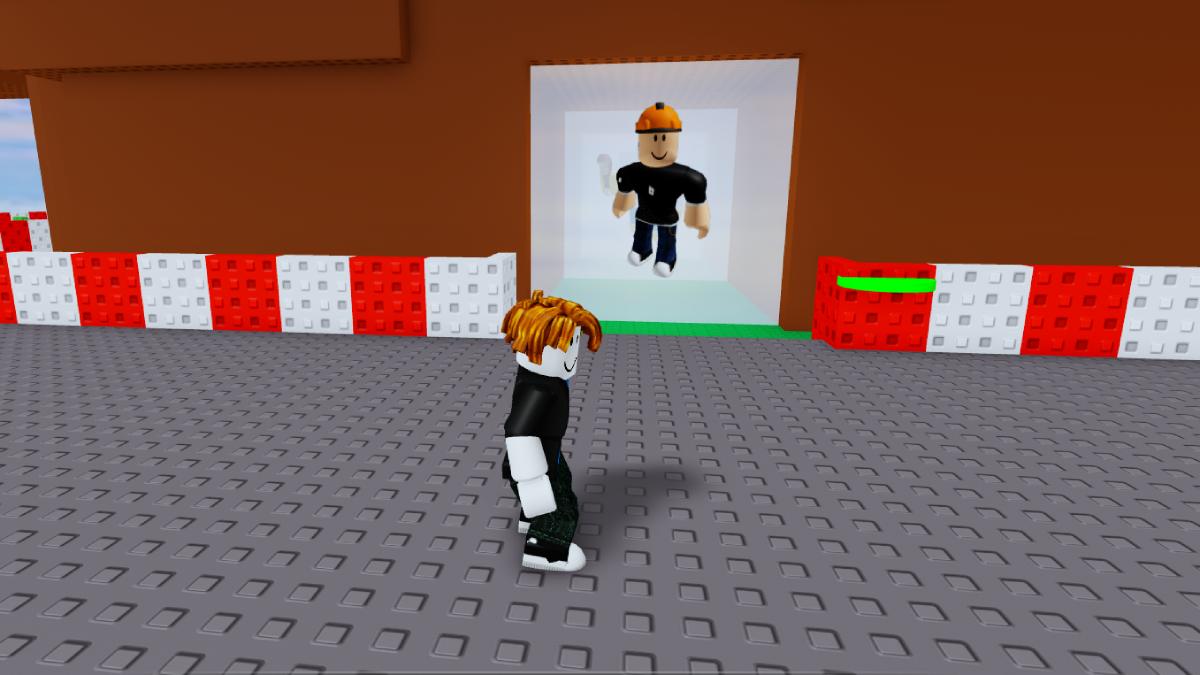 A barrier with Roblox character image engraved on it
