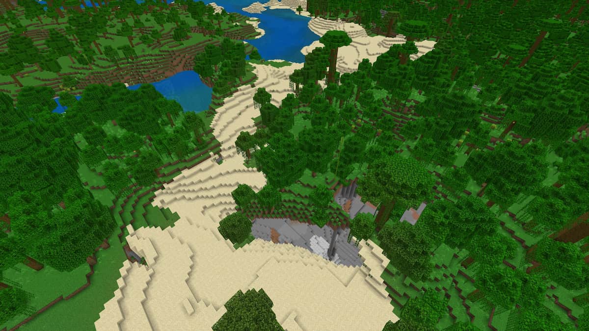 A cave between a sandy beach and a Jungle biome in Minecraft