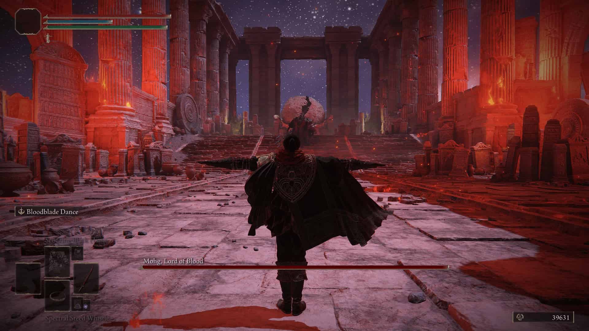 Standing in front of Mohg, Lord of Blood; boss required to beat before entering the DLC for Elden Ring.