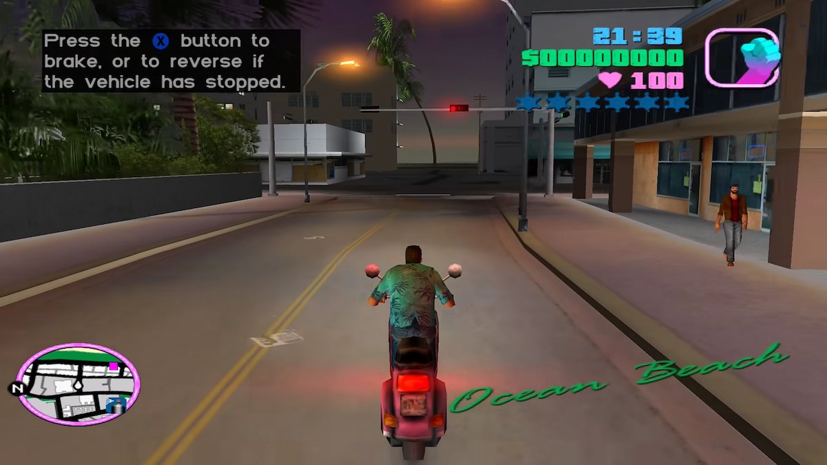 Tommy riding down a road in Ocean Beach in GTA: Vice City.