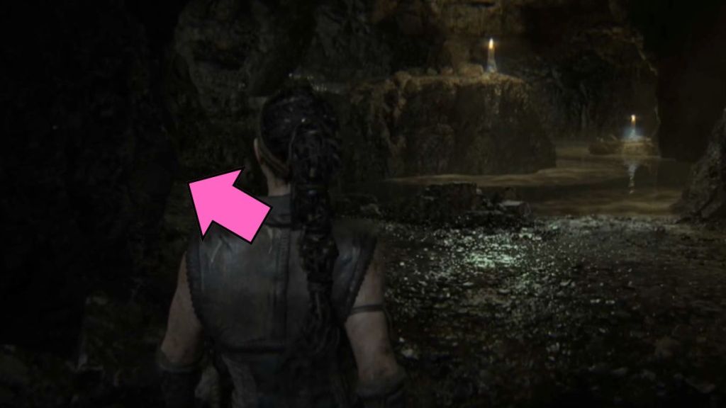 Path to the lit torch in the caves in Hellblade II