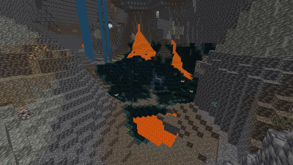 A Minecraft Deep Dark biome with several lava falls and diamonds